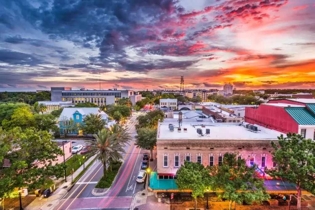 A beautiful view of Gainesville's downtown skyline with a sunset, highlighting local architecture - Website Design and Development Gainesville FL
