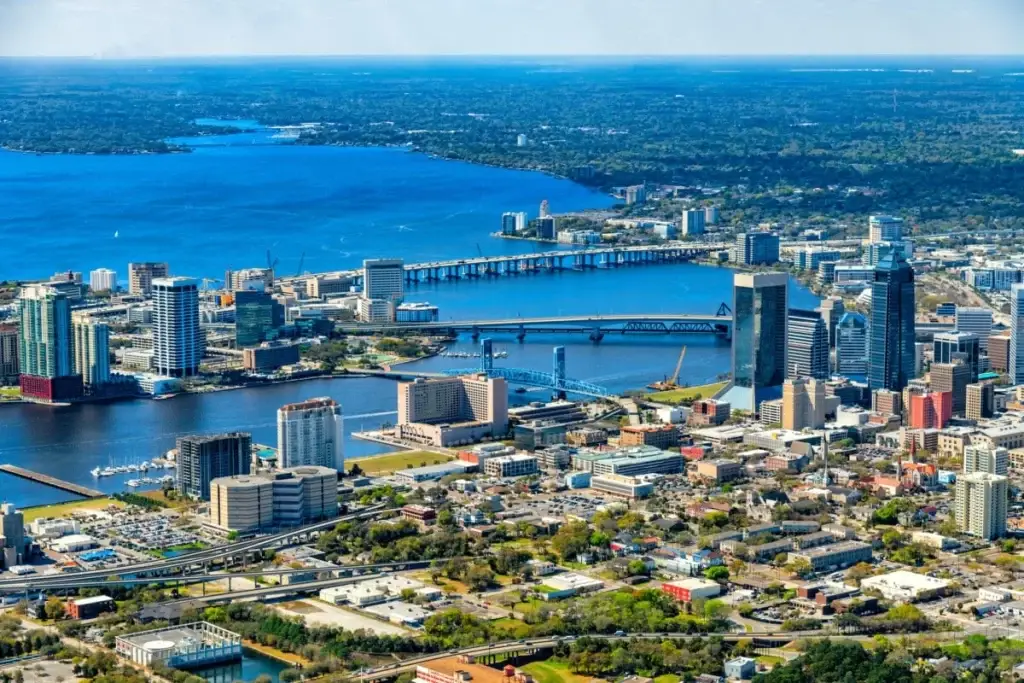 A breathtaking aerial view of Jacksonville’s skyline and St. Johns River, highlighting the city’s growth, perfect for Website Design and Development Jacksonville FL.