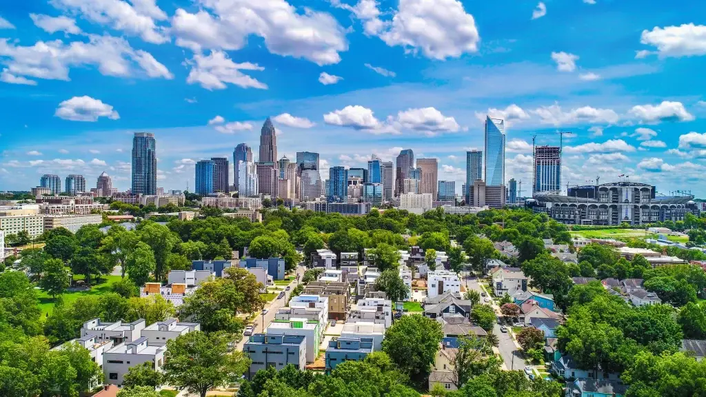 Aerial view of Charlotte skyline with green areas and the Bank of America Stadium in Website Design Charlotte NC