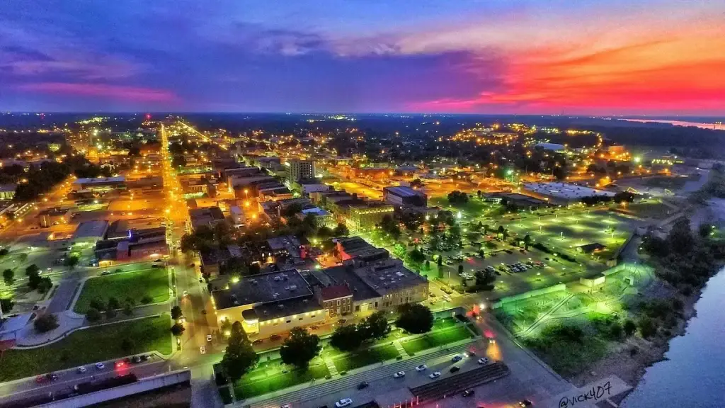 Illuminated downtown Paducah, Kentucky, stretching toward the horizon at a vibrant sunset, showing the local market for expert Website Design Paducah KY.