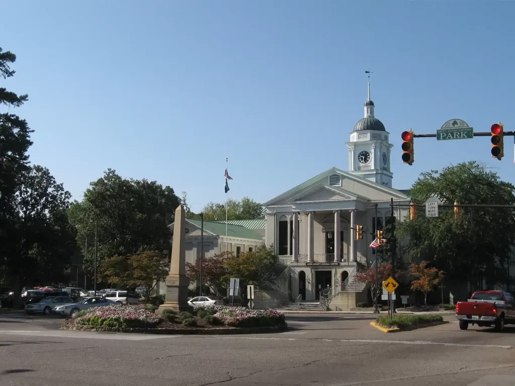 The Aiken County Courthouse with a beautiful obelisk monument in the foreground, showcasing Aiken SC’s architecture – Website Design Aiken SC.