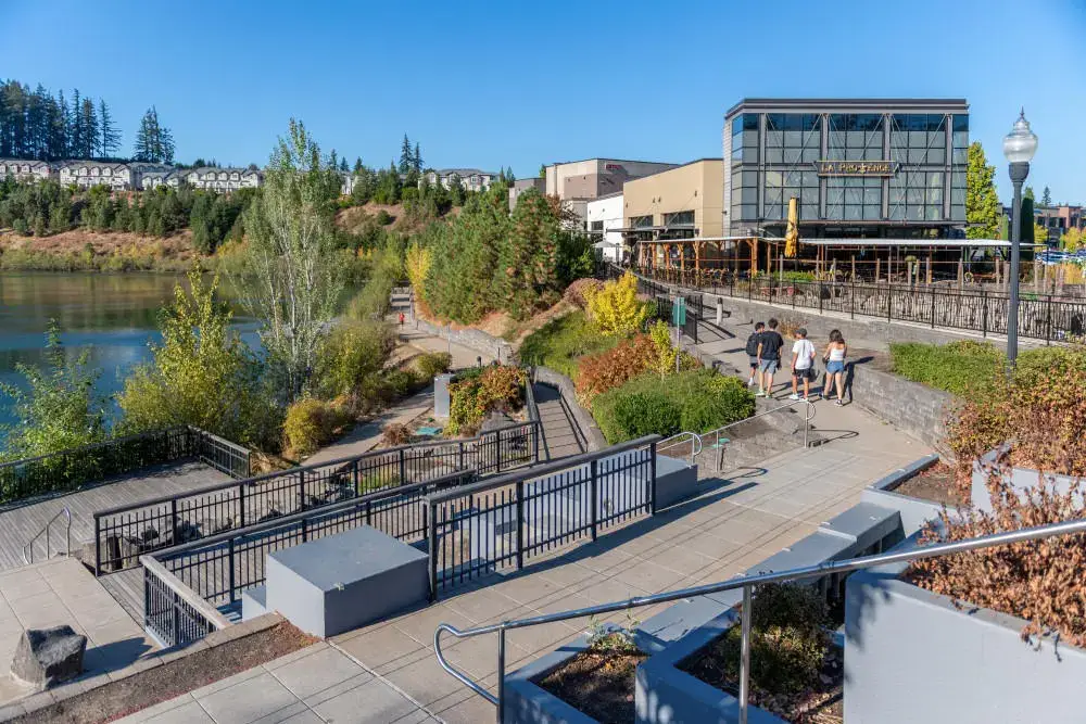 People stroll The Round plaza in Beaverton. Success in this community is often built on effective local Website Design Beaverton OR.