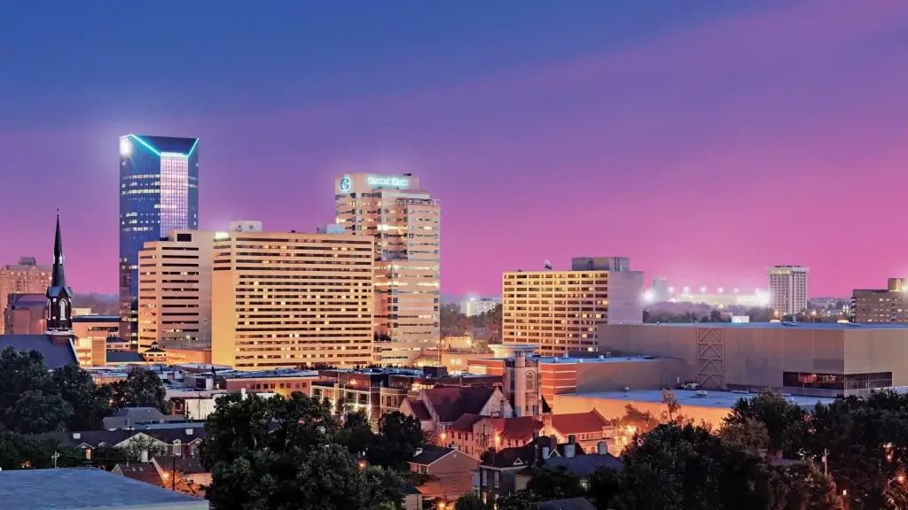 The downtown Lexington skyline at night, with glowing buildings and a stunning sky, ideal for Website Design Lexington KY.